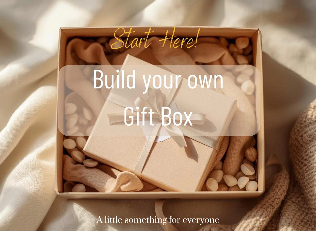 Gift box with wooden items and text 'Start Here! Build your own Gift Box' on a soft beige background.